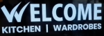 Welcome Kitchens Wardrobes Company Logo